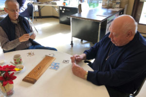 Don Edney (left) and Wally Budsberg (right) play cribbage at the Washougal Community Center, Jan. 7, 2019. (Kelly Moyer/Post-Record files)