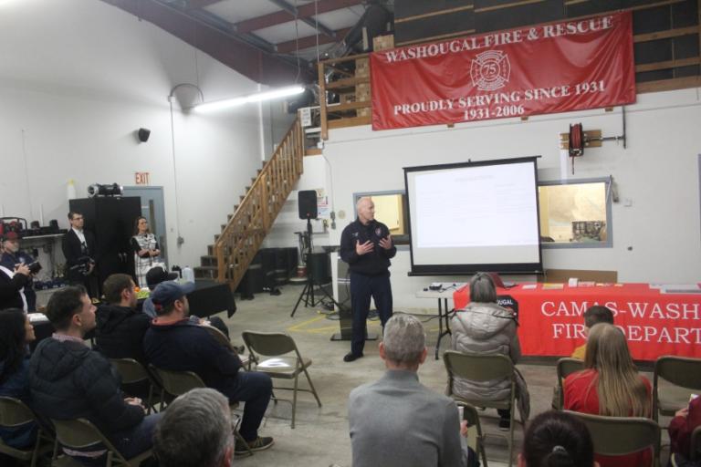 Attendees listen to Camas-Washougal Fire Department Chief Cliff Free talk during an open house on Thursday, Feb. 22, 2024, at Camas-Washougal Fire Department Station 43, in Washougal.