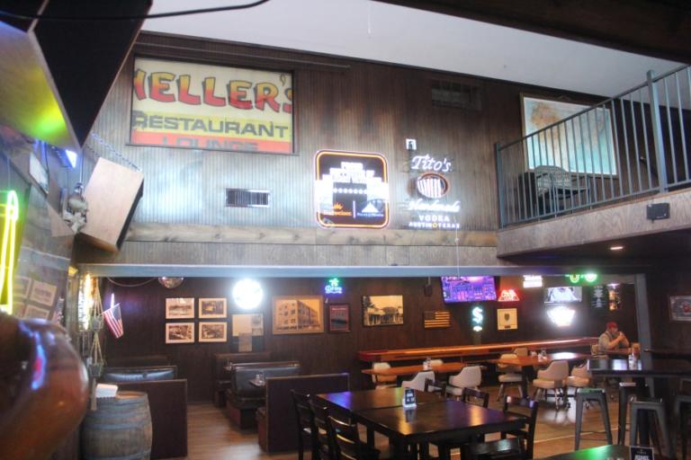 A vintage Heller&rsquo;s Restaurant sign hangs on a wall at the Washougal Times in February 2024.