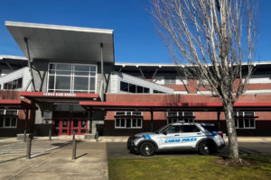 A Camas Police Department vehicle sits in front of Camas High School, Thursday, March 23, 2023. (Kelly Moyer/Post-Record files)