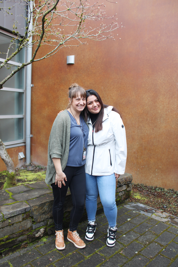 Hayes Freedom senior Maria Navarro Alejandres (right) hugs her art teacher, Miranda Wakeman, outside the Jack, Will and Rob Center, March 11, 2024. (Kelly Moyer/Post-Record (above))