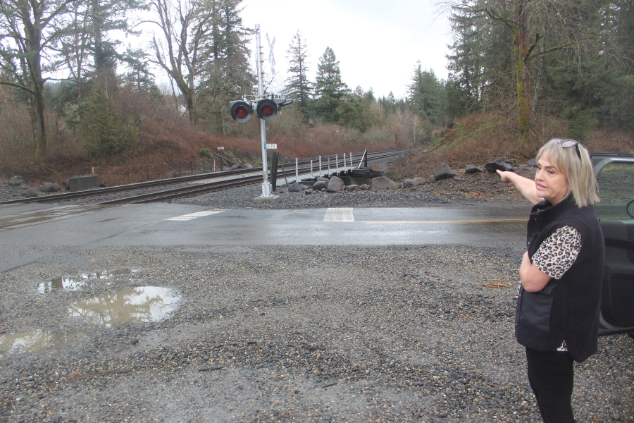 Skamania Landing resident Cindy Schmid-Potter talks about the community&rsquo;s east railroad crossing, Tuesday, March 12, 2024. (Photos by Doug Flanagan/Post-Record)