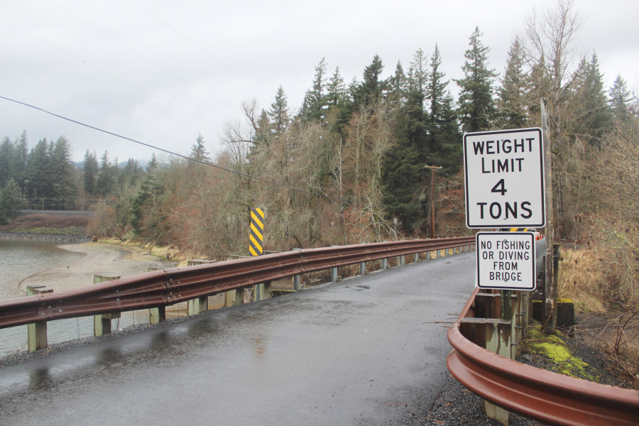 A one-lane wooden truss bridge in Skamania County leads into Skamania Landing March 12, 2024.