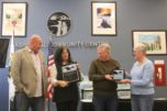 Rose Jewell (second from left), the city of Washougal&rsquo;s community engagement manager, presents plaques to Chuck and Barbara Carpenter (second from right and far right) as the winners of the 2023 Rose M. Jewell Volunteer of the Year award as Mayor David Stuebe looks on during the city of Washougal&rsquo;s Hometown Heroes event, held March 21 at the Washougal Community Center. (Doug Flanagan/Post-Record)