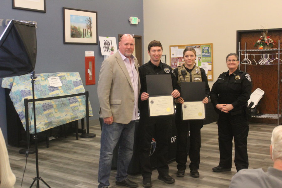 Doug Flanagan/Post-Record
Washougal police officers Trevor Claudson (second from left) and Virginia Smith (second from right) hold certificates of merit alongside Mayor David Stuebe (far left) and Washougal Police Chief Wendi Steinbronn (far right) during the city of Washougal’s Hometown Heroes event, held March 21 at the Washougal Community Center.