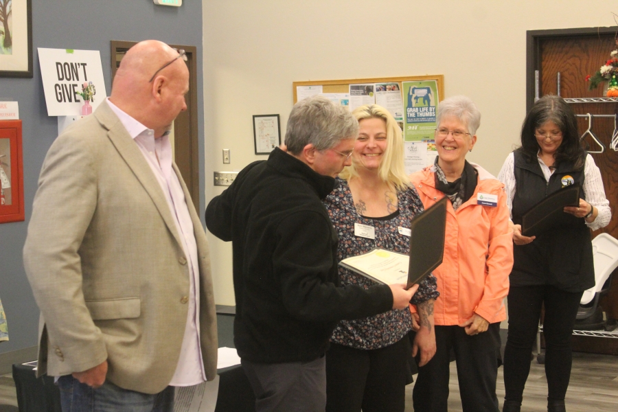 Doug Flanagan/Post-Record
Washougal City Manager Davi Scott ((second from left) presents certificates of merit to community volunteers Ann Stevens (center) and Susan Bennett (second from right) as Mayor David Stuebe (far left) and community engaggement manager Rose Jewell (far right) look on during the city of Washougal’s Hometown Heroes event, held March 21 at the Washougal Community Center.