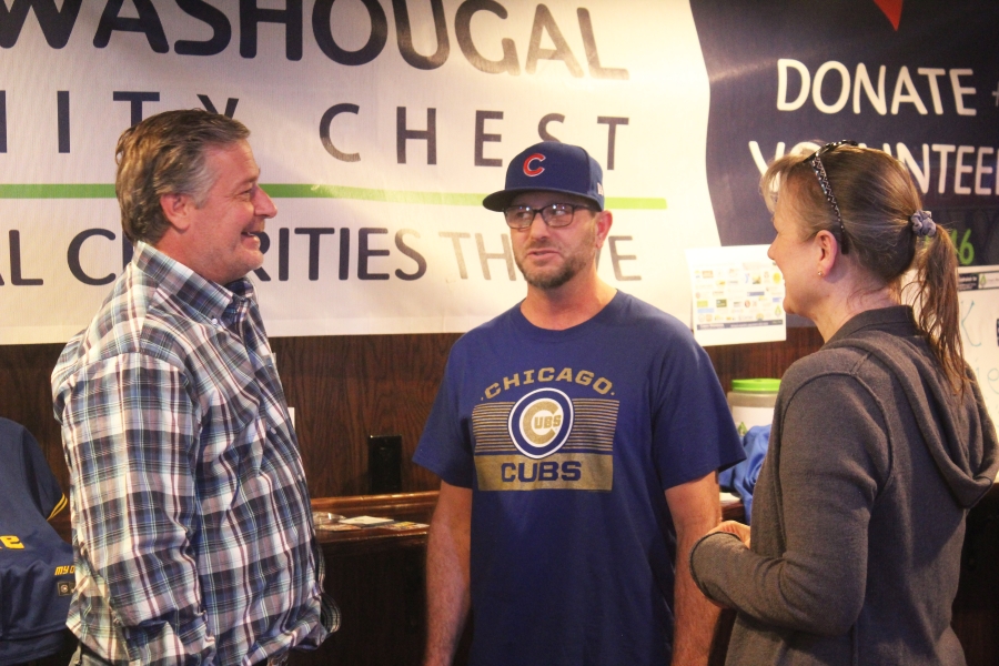 Doug Flanagan/Post-Record 
 Jamie Moyer (left), a Washougal resident and former Seattle Mariners pitcher, talks to attendees during the Camas-Washougal Community Chest's "Pitching In for a Cause" fundraising event, held March 25 at the Washougal Times.