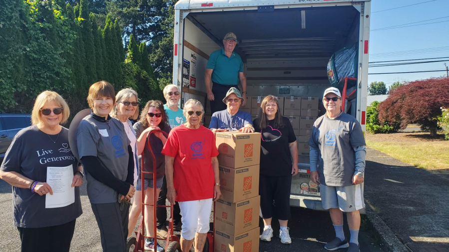 Volunteers from Impact Camas-Washougal at St. Matthew Lutheran Church collect deliveries for low-income families in 2023. The Impact Camas-Washougal program is a 2024 Camas-Washougal Community Chest grant recipient and will use the money to buy food and grocery gift cards for families in need in the Camas and Washougal school districts. (Contributed photo courtesy of the Camas-Washougal Community Chest) 