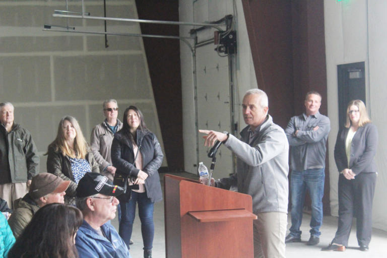 Port of Camas-Washougal Chief Executive Officer David Ripp (at podium) speaks during a ribbon-cutting ceremony for the Clark Public Utilities&rsquo; Community Solar East project at the Port&rsquo;s industrial park, March 27, 2024.