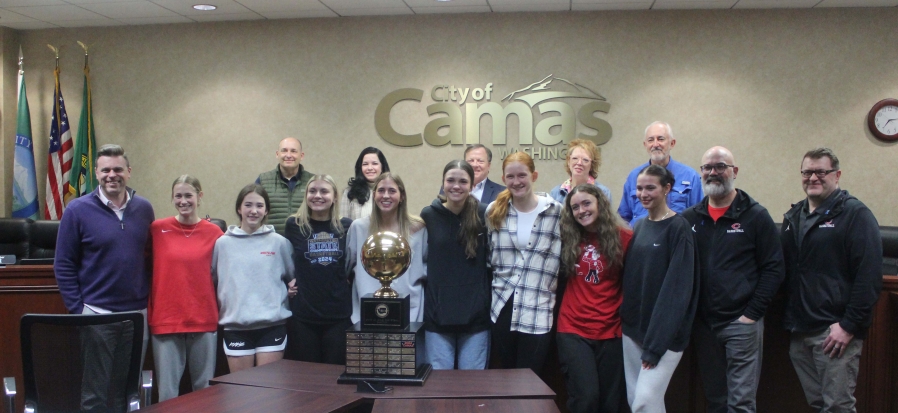 Camas High girls basketball players gather with Camas Mayor Steve Hogan and Camas City Council members, April 15, 2024. (Doug Flanagan/Post-Record)