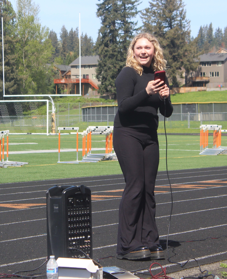 Washougal High School student Grace Perkins speaks during a student walkout to prostest Washougal School District&rsquo;s proposed budget cuts on April 10 at Fishback Stadium.