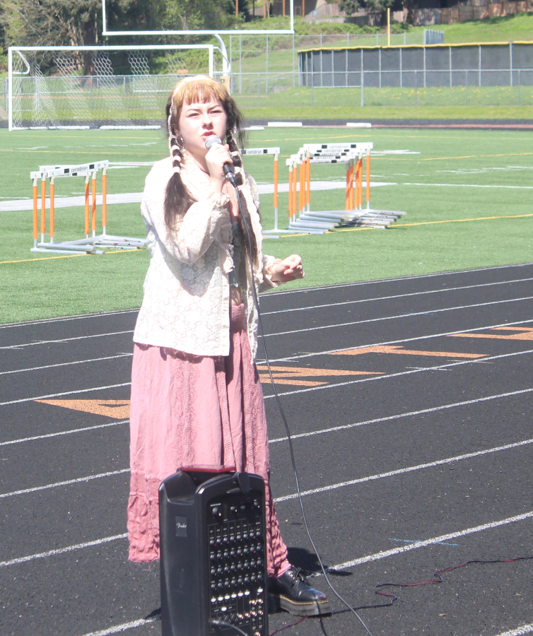 Doug Flanagan/Post-Record
Washougal High School student PJ Hopmeier speaks during a student walkout at Fishback Stadium to prostest Washougal School District&rsquo;s proposed budget cuts, April 10, 2024.