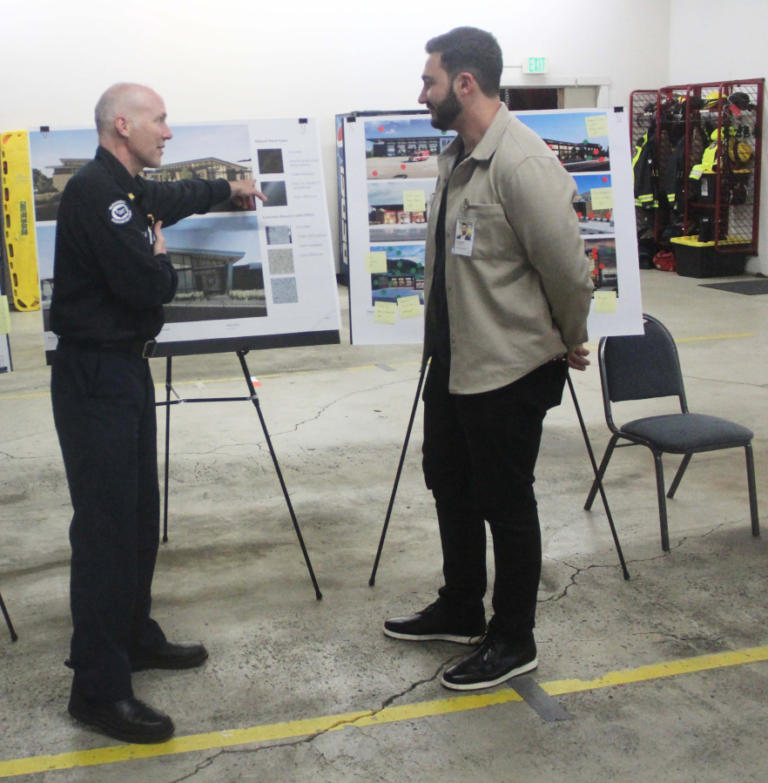 Camas-Washougal Fire Department Fire Chief Cliff Free (left) and Adam Goldberg of MacKenzie Architecture talk about the city of Washougal&rsquo;s new fire station project during an open house in Washougal, April 11, 2024.