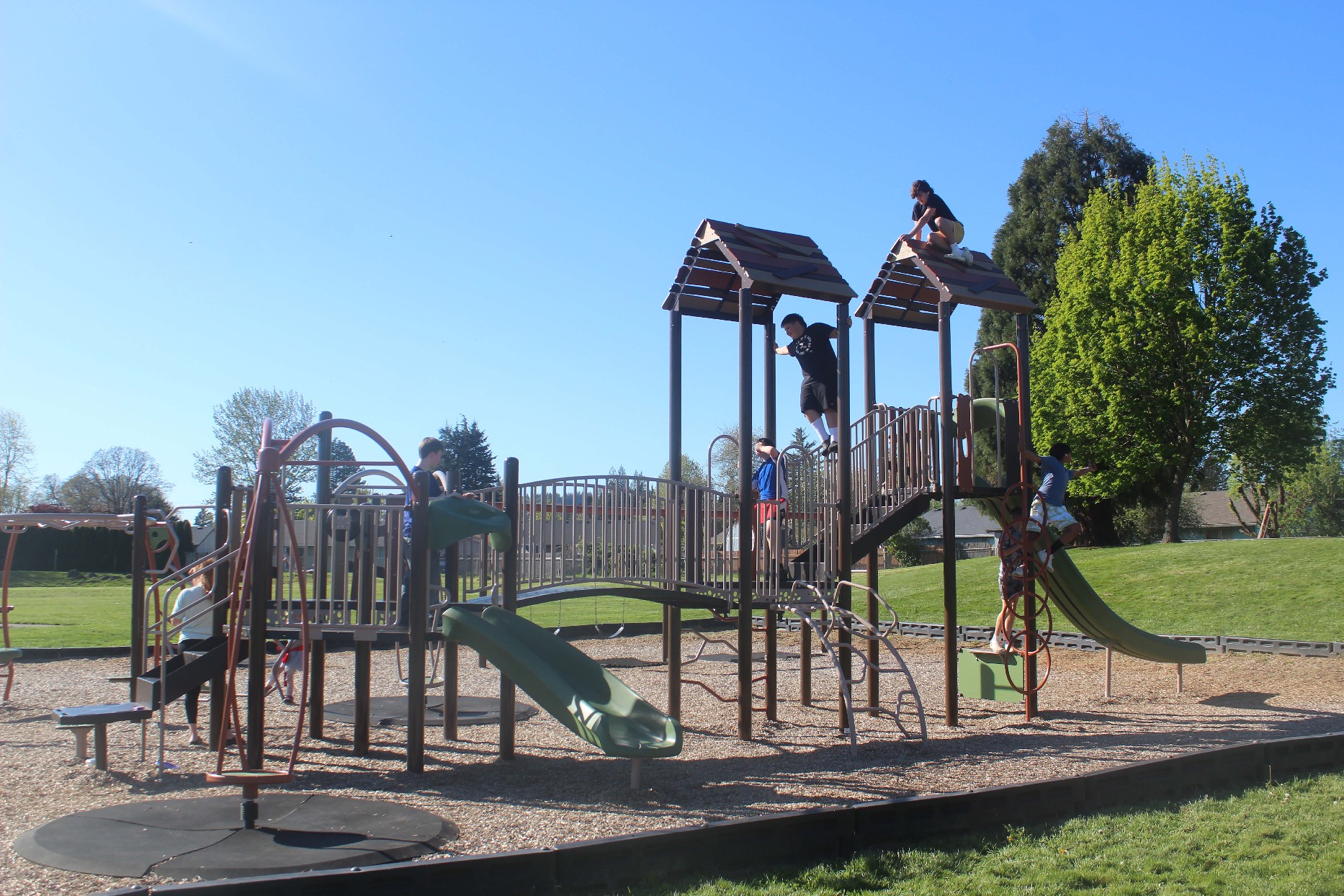 Children play at Hamllik Park in Washougal on April 18, 2024 (Doug Flanagan/Post-Record)