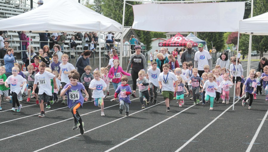Children run from the starting line during the 2023 Student Stride for Education event in Washougal. (Contributed photo courtesy of Greg Brown)