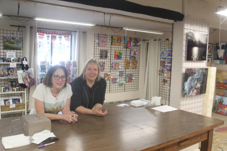 Doug Flanagan/Post-Record 
 Adret Artist Collective members Deborah Nagano (left) and Tamara Dinius pose for a photograph at the Collective&#039;s shared studio space in Washougal on May 2.