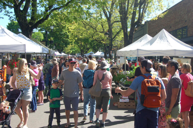 Visitors stroll down Northeast Fourth Avenue in downtown Camas during the 2023 Camas Plant & Garden Fair. This year' fair, hosted by the Downtown Camas Association, will take place from 9 a.m. to 4 p.m. Saturday, May 11, 2024.