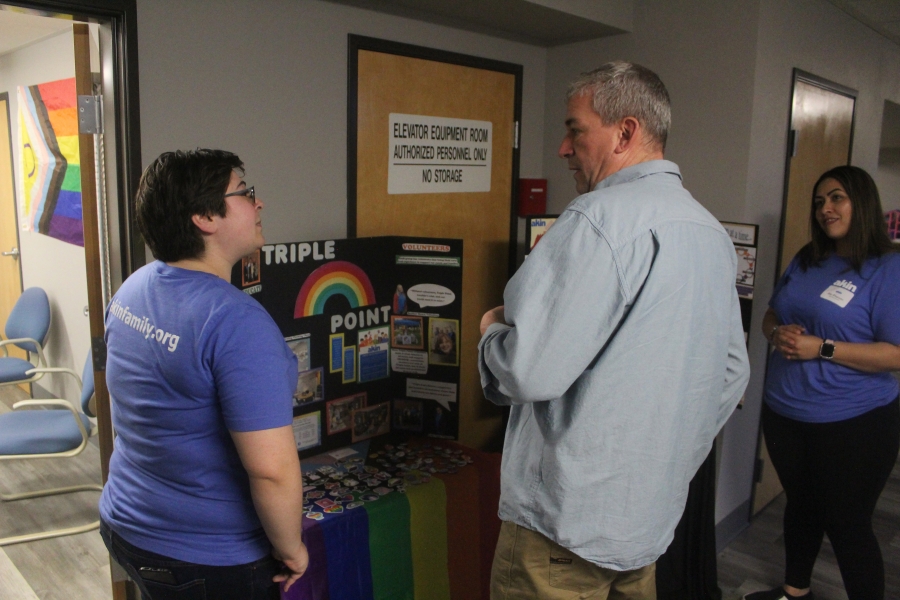 Doug Flanagan/Post-Record 
 Washougal city coucilmember talk to Akin employees during the family service organization's open house at the East County Family Resource Center on May 9. (Doug Flanagan/Post-Record)