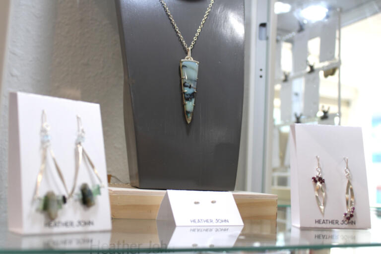 Jewelry by artist Heather John sits inside a display case at Gallery 408 in downtown Camas during the gallery's grand opening celebration, Friday, May 31, 2024.