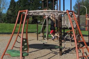 A child plays on the playground at Hamllik Park in April 2024. (Doug Flanagan/Post-Record)