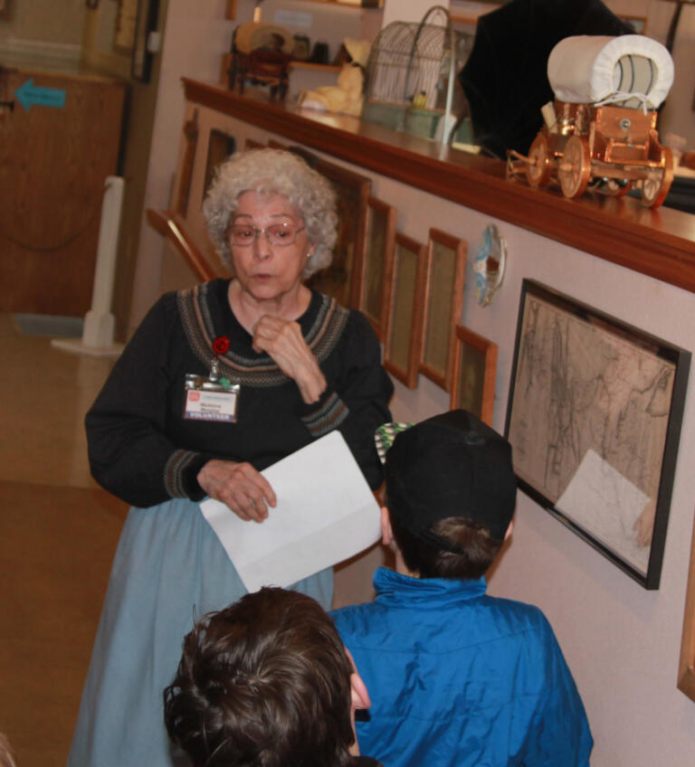 A volunteer listens to questions from Gause Elementary School students during a field trip at Two Rivers Heritage Museum on Jan. 28, 2025.