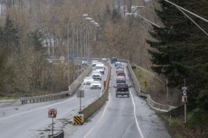 Traffic moves over the Highway 14 bridge that crosses the Camas Slough on Tuesday, Feb. 25, 2025, in Camas. The City of Camas is working to secure funds to replace the bridge. (Taylor Balkom/The Columbian)