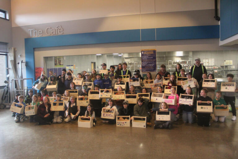 Columbia River Gorge Elementary School students pose for a photo with their toolboxes Feb.