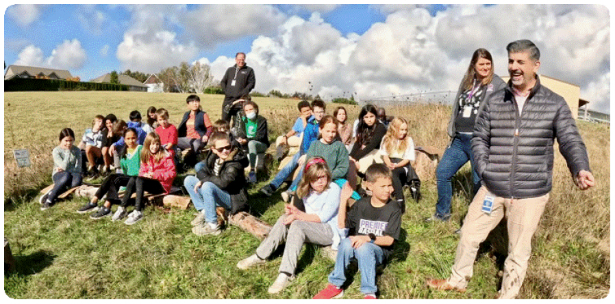 Contributed by Molly McKay Williams
Camas School District Superintendent John Anzalone, right, visits a group of Prune Hill Elementary School fifth-graders at the school’s outdoor living lab in an undated photo. Spearheaded by Molly McKay Williams, the president of the Camas Earth Day Society and the mother of a former Prune Hill student, the living lab offers students a way to connect with the natural world and learn about the environment in their school’s own backyard.