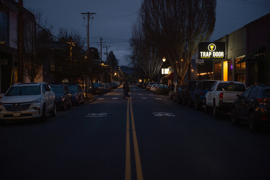 Washougal’s Main Street looks dark on a recent night. City Councilor Molly Coston is advocating for the City of Washougal to upgrade the lighting and brighten a dark downtown. (James Rexroad/for The Columbian)