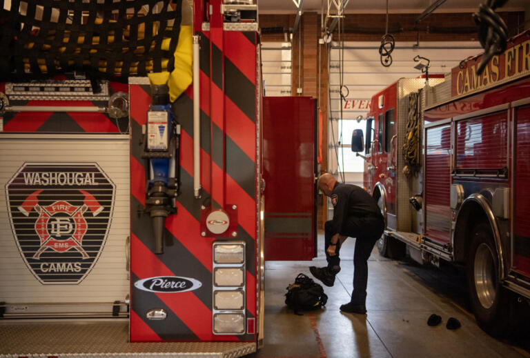 Capt. James Tierney gears up Friday, March 21, 2025, at the Camas-Washougal Fire Department's Station 42 in Camas.