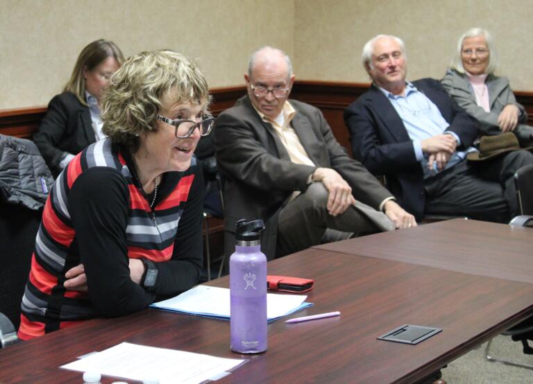 Alison Livett, second from left, an applicant for the Camas City Council’s vacant Ward 2 seat speaks to council members Tuesday evening, April 8, 2025, inside Camas City Hall as other council applicants Jill Walters, left, Jim Roy, third from left, and Gary Gaskill, second from right, look on.