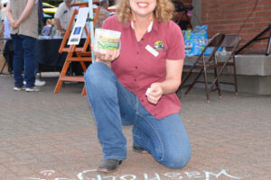 Suzanne Grover displays her love of Washougal with a chalk drawing during the 2018 Washougal Art Festival. (Courtesy of Rene Carroll)